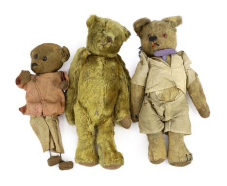 An early 20th century German Teddy bear, mohair plush and boot-button eyes, 12in., and two other Teddy bears***CONDITION REPO