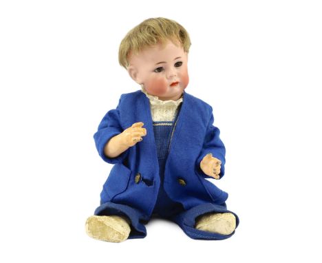 A Kammer & Reinhardt / Simon & Halbig bisque character doll, German, circa 1911, impressed 115/A 38, with closed pouty mouth,
