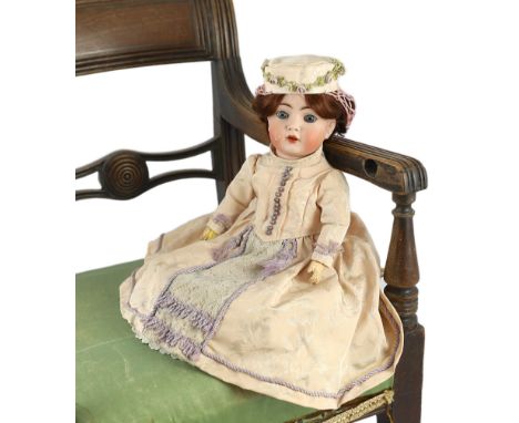 A Kammer & Reinhardt / Simon & Halbig bisque character doll, German, circa 1911, impressed 117n 36, with open mouth and upper