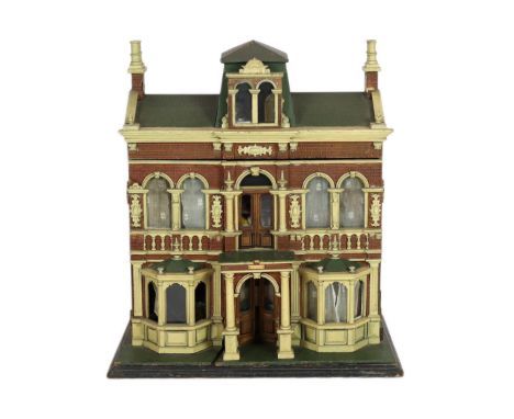 A Moritz Gottschalk furnished dolls’ house, circa 1885, elaborately made as a grand double-fronted house, the central porch f