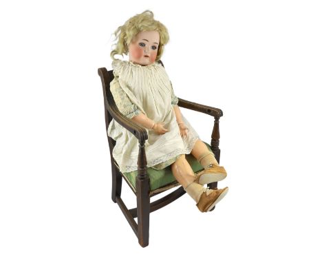 A Kammer & Reinhardt / Simon & Halbig bisque doll, German, circa 1892, impressed K star R Simon & Halbig, 76, W on forehead, 