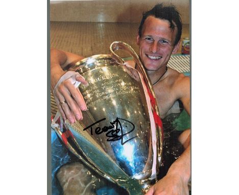 Football Teddy Sheringham signed 12x8 colour photo pictured holding the Champions League Trophy. Good condition. All autograp