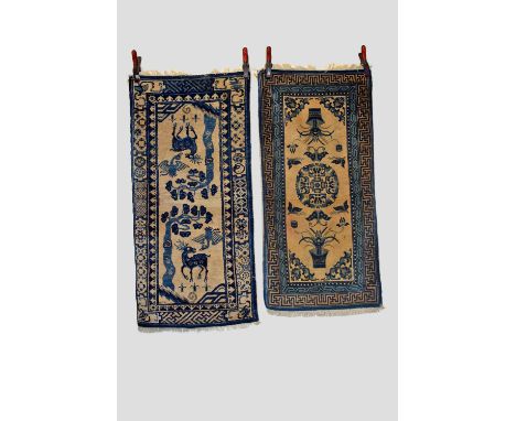 Two Baotou-Suiyuan pictorial rugs, north west China, first half 20th century, the first depicting stags and a crane under a f