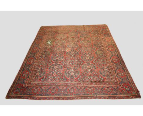 Donegal carpet, Ireland, early 20th century, 13ft. 6in. X 11ft. 1in. 4.12m. X 3.38m.  Overall wear, heavier in some places; c