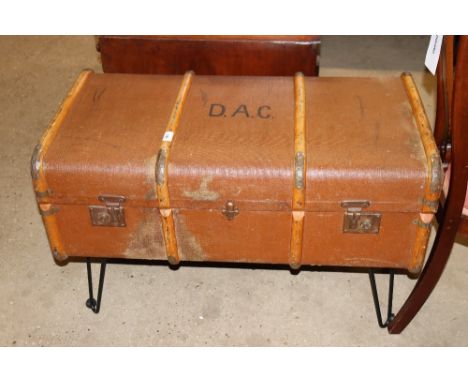 A retro design trunk / occasional table on metal supports 