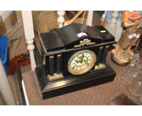 A Victorian marble mantel clock 