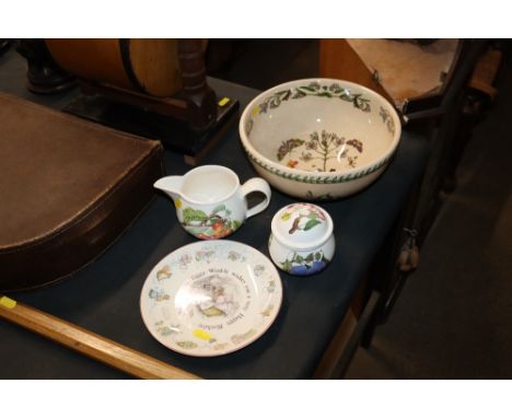 A Portmeirion "Botanic Garden" pattern bowl; Portmeirion "Pomona" jug and matching sucrier and a Wedgwood Beatrix Potter plat