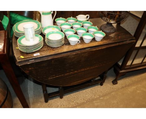 An oak gate leg dining table 