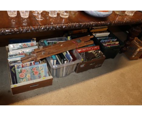 Four boxes of various books including works on art and a folding easel