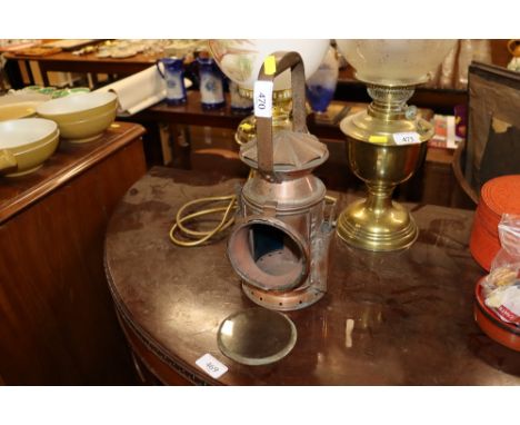 A vintage copper lamp