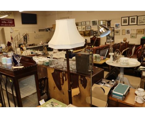 A mahogany turned standard lamp and shade; and a modern adjustable lamp