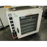 Across Vacuum Oven