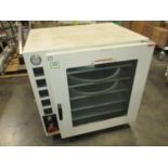 Across Vacuum Oven