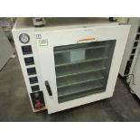 Across Vacuum Oven