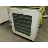 Across Vacuum Oven