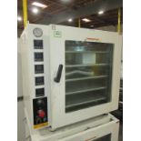 Across Vacuum Oven