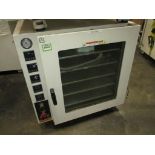 Across Vacuum Oven