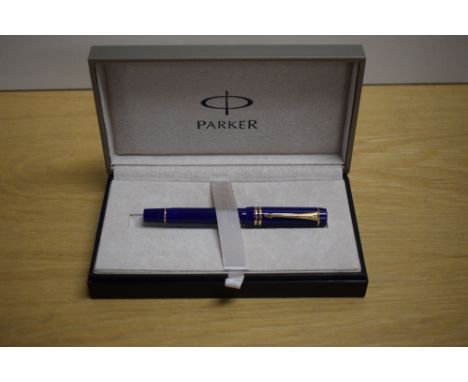 A boxed Parker Duofold International converter fill fountain pen in Lapis lazulii with gold trim having Duofold Parker 18k 75