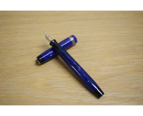 A Parker Duofold Lady button fill fountain pen in lapis lazulii with three gold bands to the ring top cap having a Parker Duo