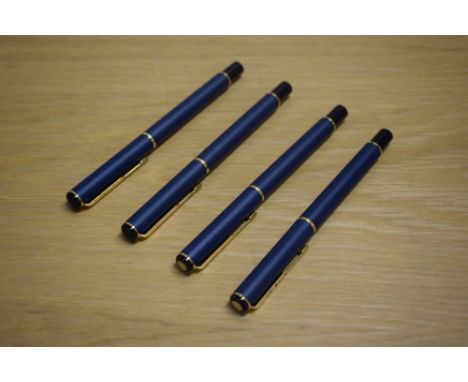 Three Parker Rialto converter fill fountain pens and a rollerball pen in Matte Navy