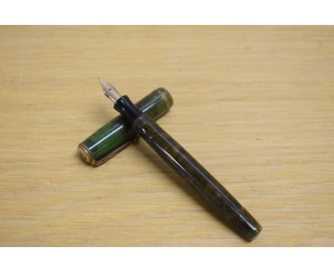 A Parker Moderne button fill fountain pen inn green and gold marble with single gold cap band having Parker Fountain Pen 14k 