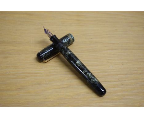A Parker Televisor Standard button fill fountain pen in lined green with three gold cap bands having Parker Fountain Pen 14K 