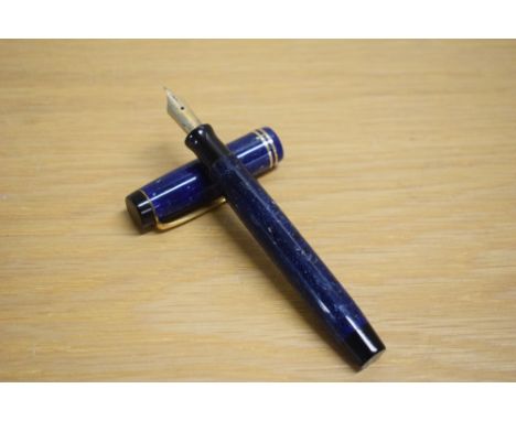 A Parker Duofold Senior button fill fountain pen in lapis lazulii with two gold bands to the cap having a Parker Duofold Pen 