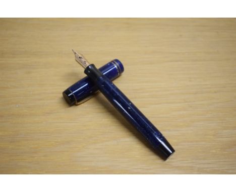 A Parker Duofold Senior button fill fountain pen in lapis lazulii with two gold bands to the cap having a Parker Duofold Cana