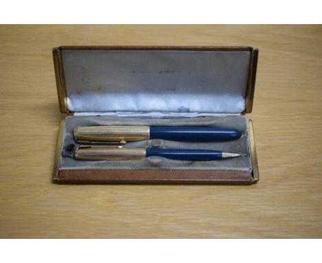 A boxed Parker 51 MKII aerometric fill fountain pen and propelling pencil in Teal blue with rolled gold cap