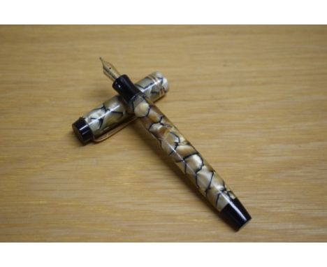 A Parker Duofold Special  button fill fountain pen in black and pearl with two gold bands to the cap having Parker Duofold 14