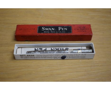 A boxed Mabie Todd &amp; Co Swan self filler lever fill fountain in grey and ruby snakeskin having Swan 2 14CT nib. Still bea