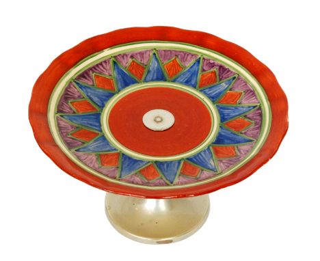 A 1920s Clarice Cliff cake stand decorated in the Original Bizarre pattern raised to a chrome stand, printed Newport mark, he