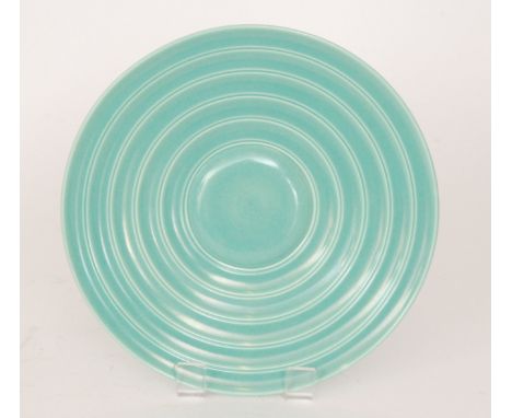 A 1950s Poole Pottery Celadon range shallow footed bowl with ribbed banding to the interior, impressed and painted mark, inci