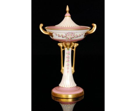 A late 19th to early 20th Century Mintons twin handled pedestal cup and cover decorated with garlands and trails of pink flow