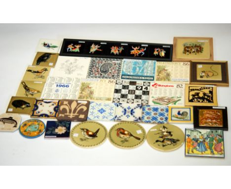 A large collection of assorted later 20th Century English and Continental dust pressed and plastic clay tiles to include Pilk