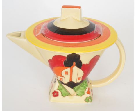 A Moorland teapot in the Clarice Cliff style hand painted by former Bizarre girl Rene Dale in a stylised tree and cottage lan