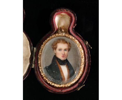 A mid 19th Century gilt metal mounted mourning open pendant/brooch, oval three quarter length portrait miniature of a gentlem
