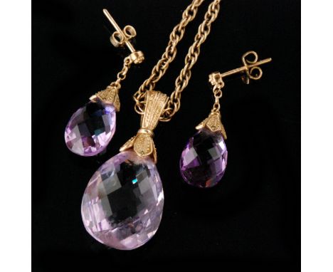 A modern amethyst pendant necklace designed as a pear shaped facet cut amethyst with beaded foliate suspension loop, all to 9