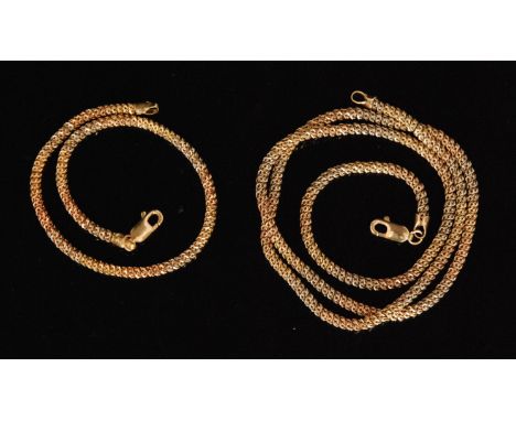 A Continental 18ct three tone rope twist necklace and bracelet set, total weight 18g, stamped 750 with Egyptian hallmarks (2)