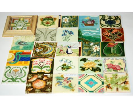 A collection of assorted 19th Century and later tiles in the Art Nouveau style, some with tubelined decoration to include Boc