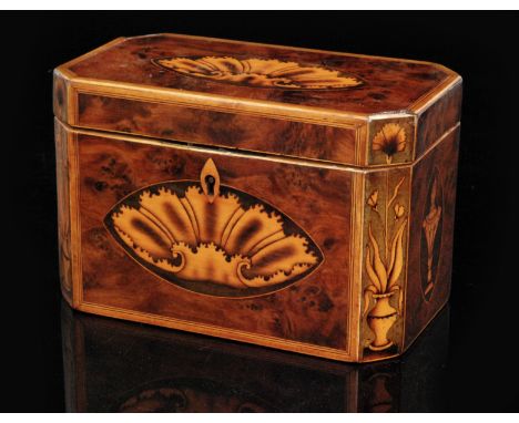 A George III burr yew wood two division tea caddy inlaid with shell paterae and canted sides, width 19cm