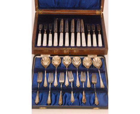 A cased set of six hallmarked silver faux mother of pearl handled fruit knives, together with a similar set of six dessert sp