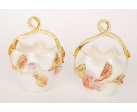 A pair of late 19th Century Continental glass posy bowls of ovoid form with wave rims, decorated with applied flowering bough