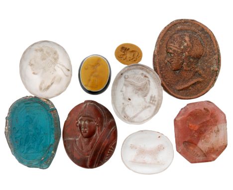 A collection of thirteen glass and crystal lozenge shaped and oval seals various portrait designs etc (13)
