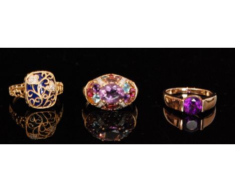 A 9ct multi coloured gem set dress ring with domed head, together with a square shaped lapis lazuli ring overlaid with diamon