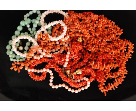 Six rows of assorted coral beads together with a similar graduated single jadite row and a pair of cultured pearl drop earrin