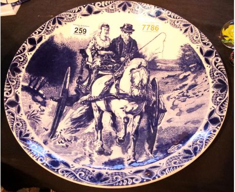 Hand painted Delftware ceramic charger plate depicting a gent and lady on horse drawn carriage. Not available for in-house P&