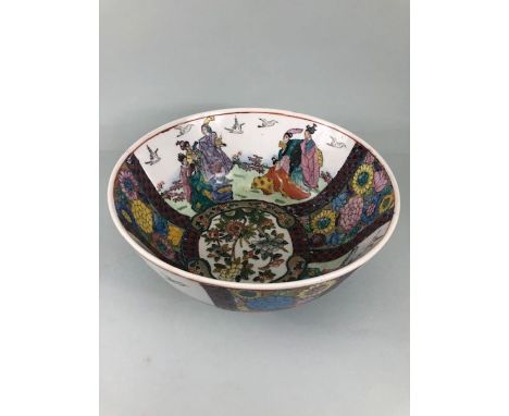 Oriental dish, Chinese style Ceramic dish with painted decoration of courtiers, birds and flowers approximately 31cm diameter