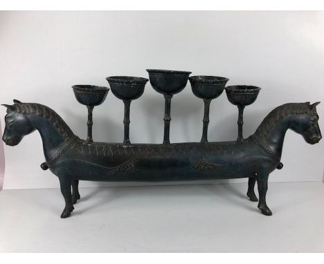 Mongolian style twin horse figure in metal designed as 2 step horses wearing bells, archaic form with 5 oil lamp dishes on th