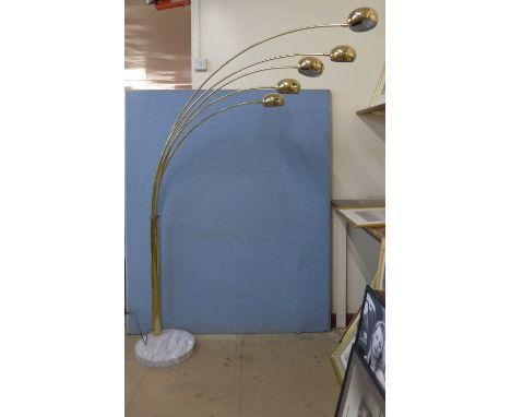 An Italian Harvey Guzzini style gilt metal and marble base floor standing arc lamp 